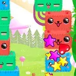 Farebné bloky s tvárami a hviezdami na hravom pozadí so stromami a lízankami