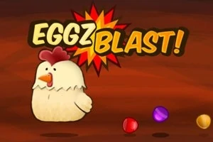 Slepica s výrazom prekvapenia v pozadí s nápisom EGGZ BLAST!