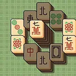 Stohované mahjong dlaždice s rôznymi symbolmi na zelenom mriežkovanom pozadí