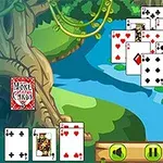 Kartové karty sú rozložené v prírodnej scéne s riekou a leknami, v pozadí je vodopád