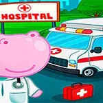 Ružový hroch oblečený ako lekár stojí pred nemocnicou s sanitkou a lekárničkou v pozadí