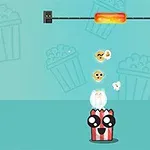 Usmiaty obal na popcorn zachytáva vyskakujúce pukance pod zohriatou tyčou na modrom pozadí s motívom popcornu