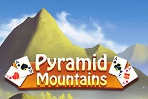 Názov Pyramid Mountains je zobrazený pred horským pozadím s kartami srdcovej a krížovej farby