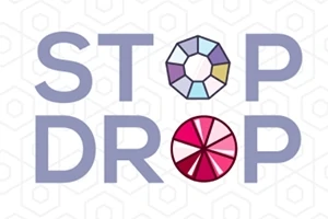 Nápis STOP DROP s geometrickými vzormi v písmenách O na bielom pozadí so vzorom šesťuholníkov