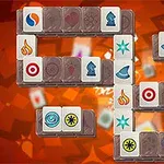 Hra Mahjong so vzorovanými kameňmi na červenom pozadí