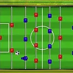 Stolný futbal na obrazovke s pákami a červenými a modrými hráčmi na zelenom ihrisku